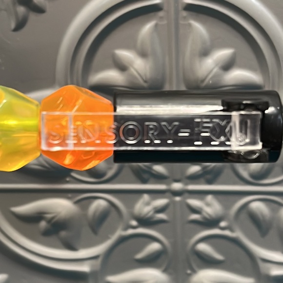 Sensory-FX pen clicks, has multicolor rolling beads pen clip folds - Picture 2 of 4